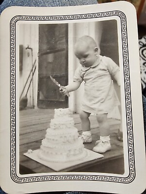 #ad Vintage Snapshot Photo Baby Cutting Cake With Large Knife Odd $19.95