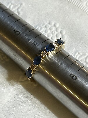 #ad 14k Diamond and Sapphire Eternity Band size 7 Marked JB 2 grams $250.00