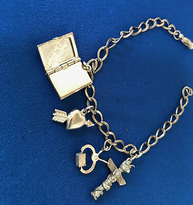 #ad VINTAGE STERLING CHARM BRACELET WIT 4 CHARMS AND OLD CLASP $45.00