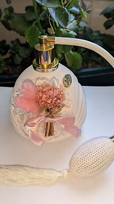 #ad Vintage Berger perfume atomizer with petite lace trimmed bouquet. $25.00