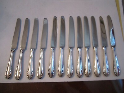 #ad 4 STERLING SILVER KNIVES FLATWARE 935 EACH KNIFE WEIGHS 93 GRAMS TUB T $112.50