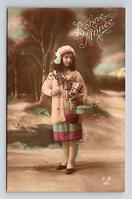 #ad c1915 RPPC French Girl Bonne Annee Gifts Flower Bouquet Hand Tinted Postcard $8.36
