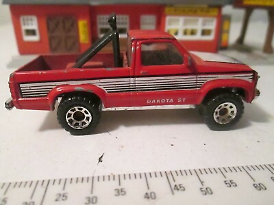 #ad Toys Matchbox Dodge Dakota ST from 1987 Red with Stripes Normally Handled Cond. $9.95