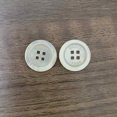GUCCI Set of 2 Tan Iridescent 4 Hole Buttons Engraved with #x27;GUCCI#x27; $40.00