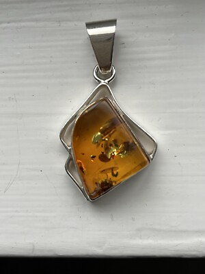 #ad Amber and Sterling Silver Pendant $50.00