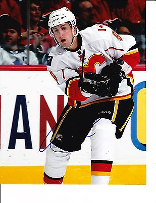 #ad CALGARY FLAMES CORY SARICH SIGNED CLEARING PUCK 8X10 $22.99