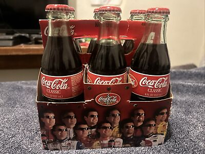 #ad coca cola collectibles bottles 6 Pack 2001 8 OZ $25.00