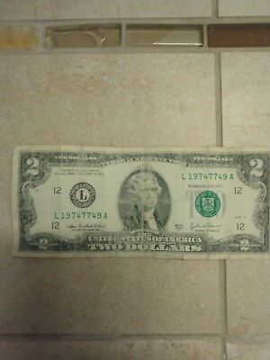 #ad 2 dollar bill 2003 series Serial# L 16976877 A $500.00