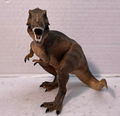 #ad Tyrannosaurus Rex 7quot; Long 6 1 2quot; Tall Brown w Dark Brown Markings Moveable Jaw $3.99