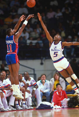 #ad Isiah Thomas Detroit Pistons shoots over Darrell Walker of Basketball 1988 Photo AU $9.00