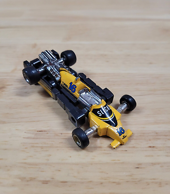 #ad Vintage Go Bots Figure Slicks Tonka Bandai Toys Race Car Yellow Black 16 $4.01