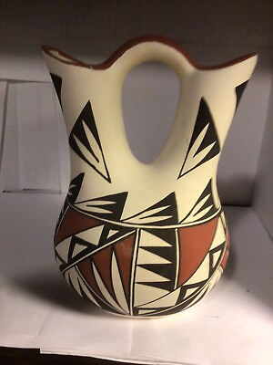 #ad Acoma Wedding Vase Signed By Trujillo 8 1 4” high 6” wide no damages $155.00