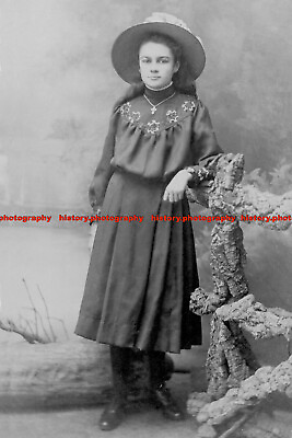 #ad #ad F004342 A girl with a big hat and necklace stands by a tree branch GBP 3.75